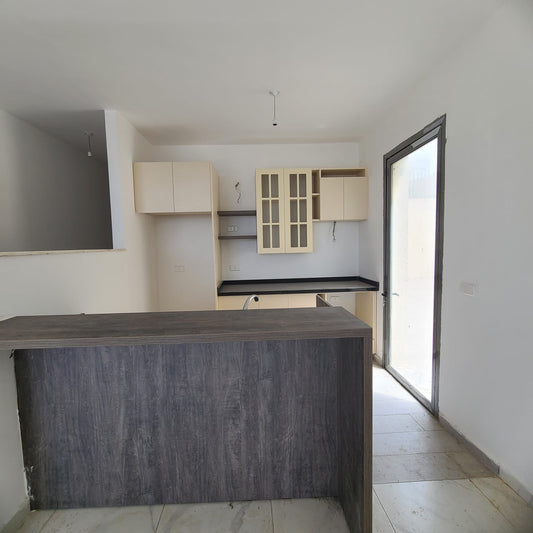 Apartment for sale in Amchit - شقة للبيع في عمشيت
