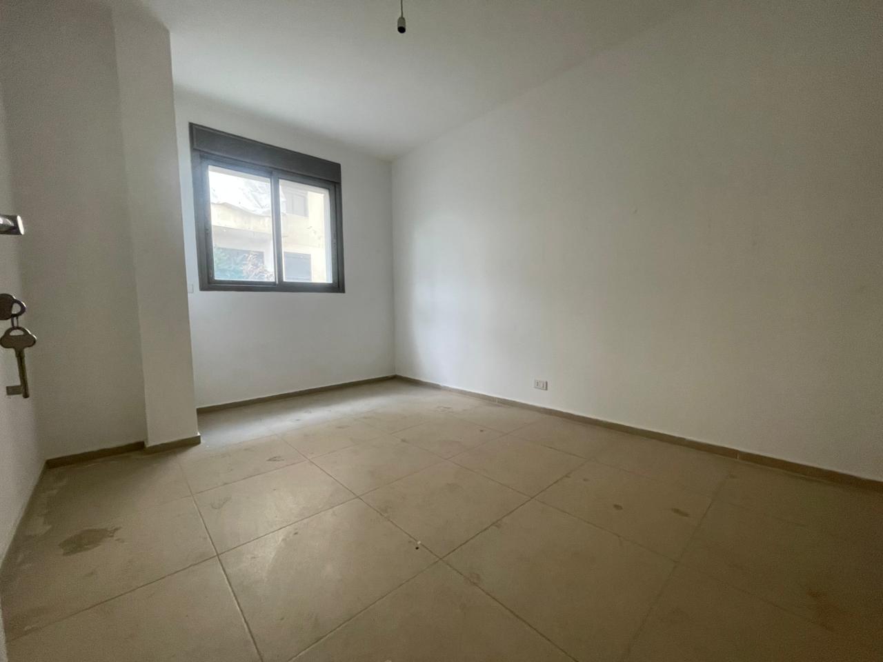 GMK234Y - Apartment For Sale In Ballouneh - شقة للبيع في بلونة