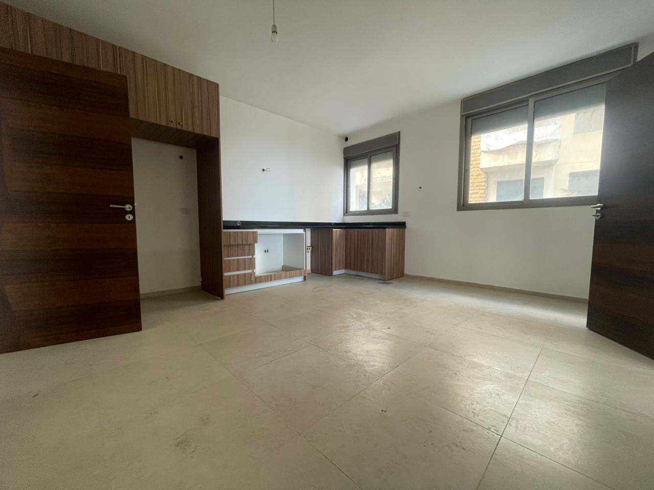 GMK234Y - Apartment For Sale In Ballouneh - شقة للبيع في بلونة