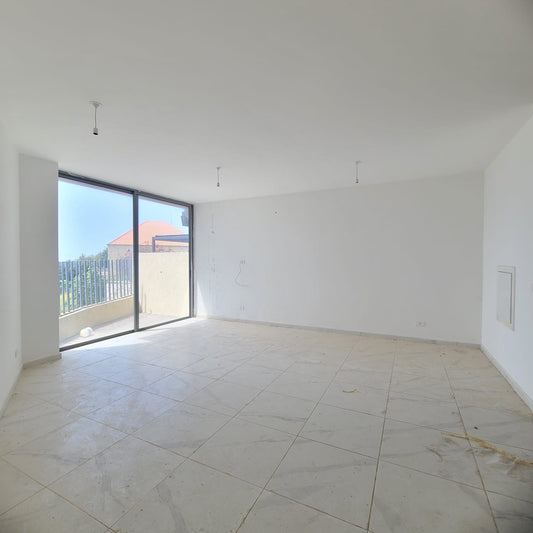 Apartment for sale in Amchit - شقة للبيع في عمشيت