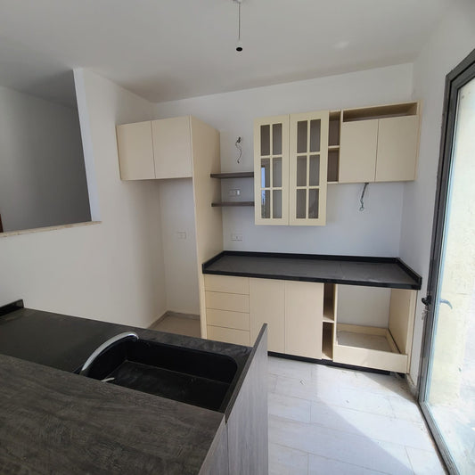 Apartment for sale in Amchit - شقة للبيع في عمشيت