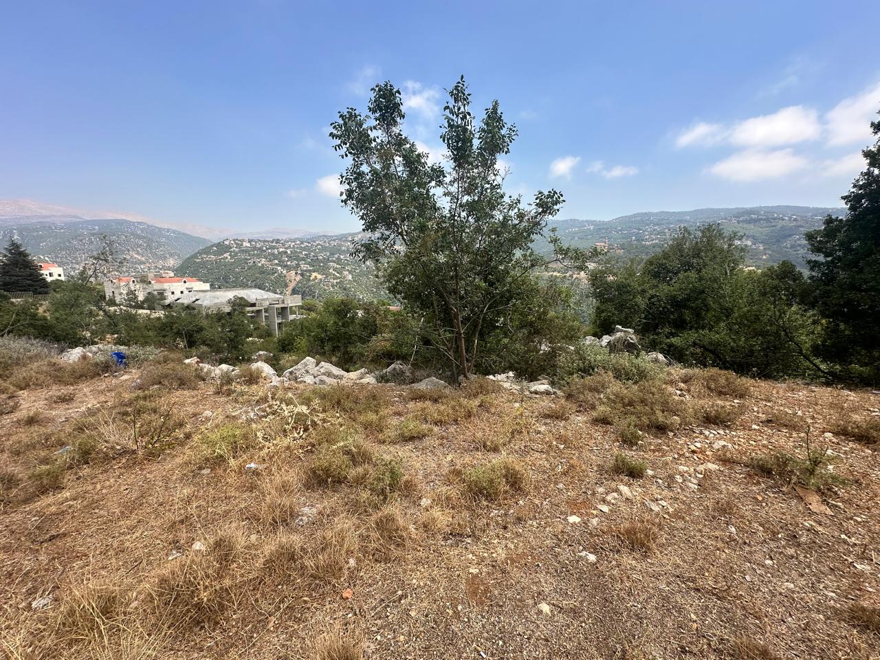 Land for sale in Ballouneh - أرض للبيع في بلونة GM164Y