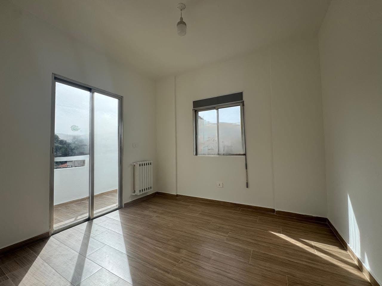 GMK232SS - Apartment For Sale In Ballouneh - شقة للبيع في بلونة
