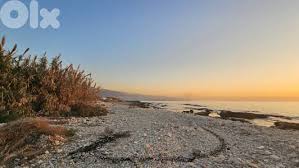 GMK166YA - Beach front land for sale in okaibe - أرض مطلة